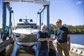 Riviera owner Rodney Longhurst (right) congratulates Peter Haig on the delivery of his 5400 Sport Yacht Platinum Edition, the 6,000th Riviera yacht launched