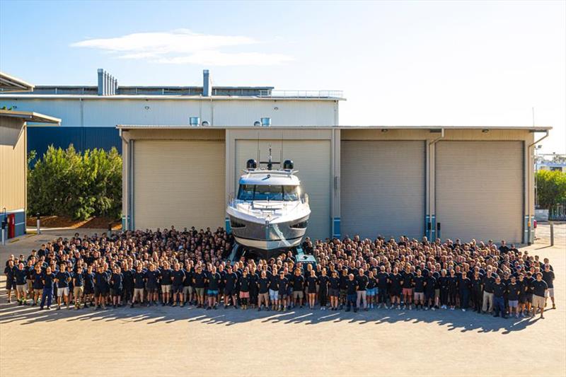 The Riviera team of 950 people celebrate the launching of the 6,000th Riviera at the company's 16.8 hectare facility on the Gold Coast photo copyright Riviera Australia taken at  and featuring the Power boat class